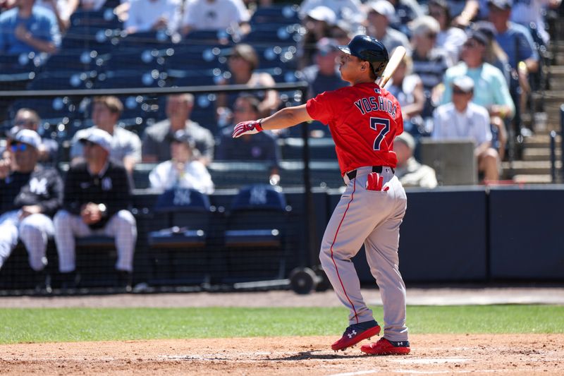 Mar 18, 2025; Tampa, Florida, USA; Boston Red Sox outfielder Masataka Yoshida (7) hits a two run home runagainst the New York Yankees in the sixth inning during spring training at George M. Steinbrenner Field. Mandatory Credit: Nathan Ray Seebeck-Imagn Images