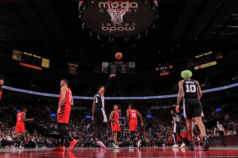 PORTLAND, OR - DECEMBER 13: Victor Wembanyama #1 of the San Antonio Spurs looks on during the game against the Portland Trail Blazers on December 13, 2024 at the Moda Center Arena in Portland, Oregon. NOTE TO USER: User expressly acknowledges and agrees that, by downloading and or using this photograph, user is consenting to the terms and conditions of the Getty Images License Agreement. Mandatory Copyright Notice: Copyright 2024 NBAE (Photo by Cameron Browne/NBAE via Getty Images)