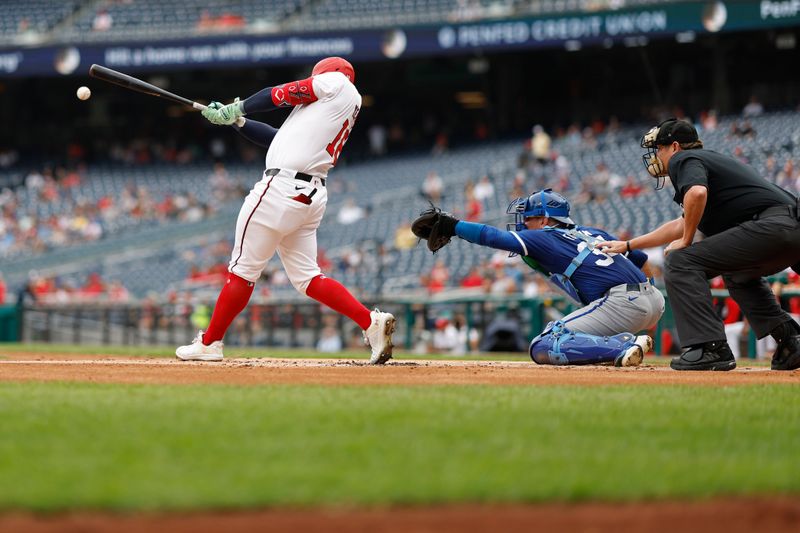 Sep 26, 2024; Washington, District of Columbia, USA; Washington Nationals first baseman Juan Yepez (18) hits an RBI single against the Kansas City Royals during the first inning at Nationals Park. Mandatory Credit: Geoff Burke-Imagn Images