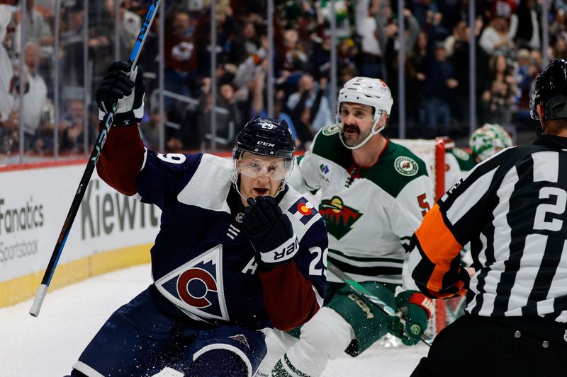 Apr 9, 2024; Denver, Colorado, USA; Colorado Avalanche center Nathan MacKinnon (29) celebrates after his hat trick goal in the second period against the Minnesota Wild at Ball Arena. Mandatory Credit: Isaiah J. Downing-USA TODAY Sports