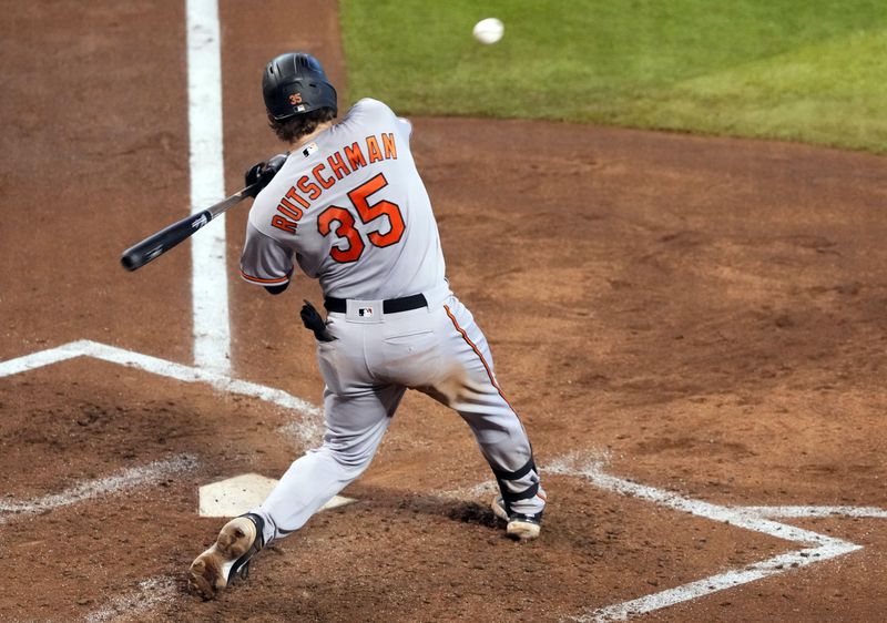 Sep 3, 2023; Phoenix, Arizona, USA; Baltimore Orioles catcher Adley Rutschman (35) bats against the Arizona Diamondbacks during the fifth inning at Chase Field. Mandatory Credit: Joe Camporeale-USA TODAY Sports