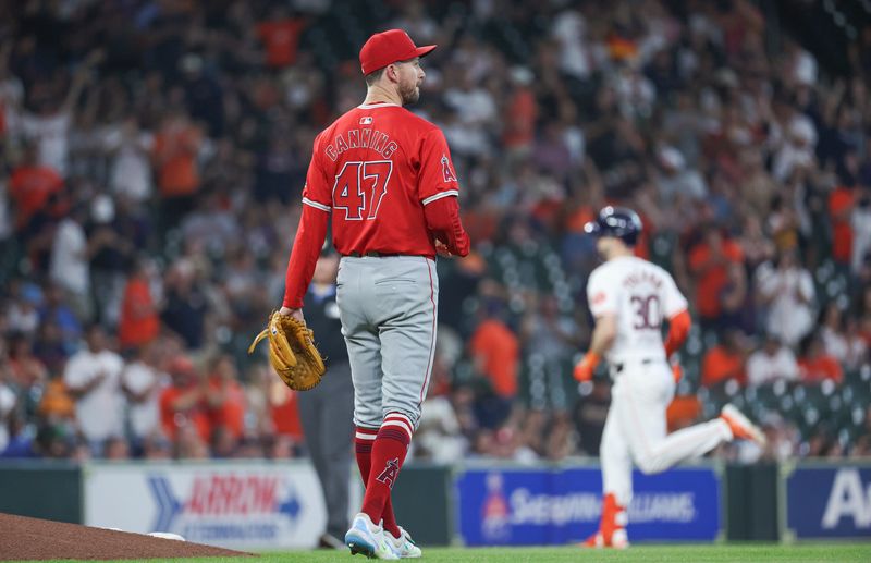 May 21, 2024; Houston, Texas, USA; Los Angeles Angels starting pitcher Griffin Canning (47) reacts and Houston Astros right fielder Kyle Tucker (30) rounds the bases after hitting a home run during the first inning at Minute Maid Park. Mandatory Credit: Troy Taormina-USA TODAY Sports