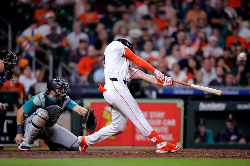 May 5, 2024; Houston, Texas, USA; Houston Astros right fielder Kyle Tucker (30) hits a two-run home run to right field against the Seattle Mariners during the sixth inning at Minute Maid Park. Mandatory Credit: Erik Williams-USA TODAY Sports