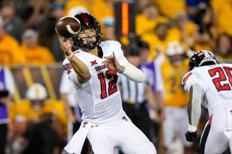 Sep 2, 2023; Laramie, Wyoming, USA; Texas Tech Red Raiders quarterback Tyler Shough (12) throws a pass against the Wyoming Cowboys during the third quarter at Jonah Field at War Memorial Stadium. Mandatory Credit: Troy Babbitt-USA TODAY Sports