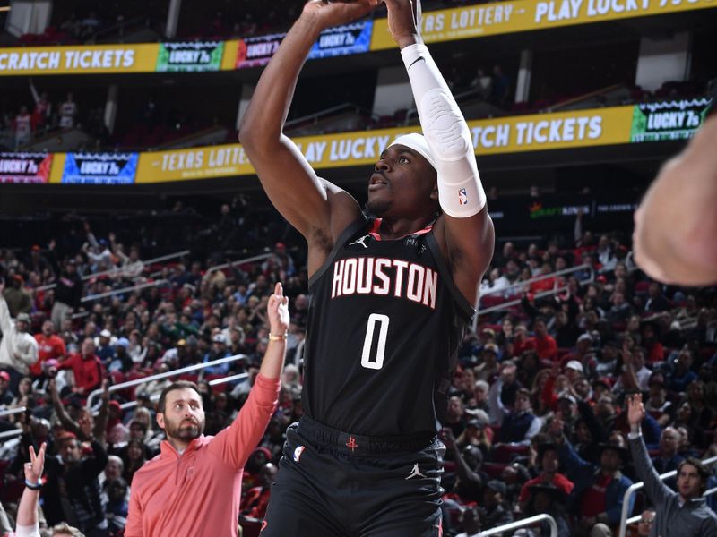 HOUSTON, TX - JANUARY 13:  Aaron Holiday #0 of the Houston Rockets shoots the ball during the game against the Memphis Grizzlies  on January 13, 2025 at the Toyota Center in Houston, Texas. NOTE TO USER: User expressly acknowledges and agrees that, by downloading and or using this photograph, User is consenting to the terms and conditions of the Getty Images License Agreement. Mandatory Copyright Notice: Copyright 2024 NBAE (Photo by Logan Riely/NBAE via Getty Images)