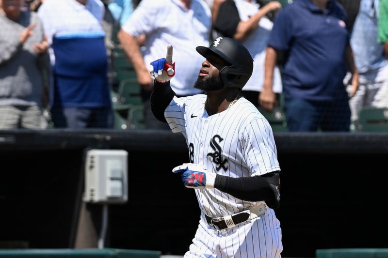 Jul 10, 2024; Chicago, Illinois, USA;  Chicago White Sox outfielder Luis Robert Jr. (88) reacts after hitting a two-run home run against the Minnesota Twins during the sixth inning at Guaranteed Rate Field. Mandatory Credit: Matt Marton-USA TODAY Sports