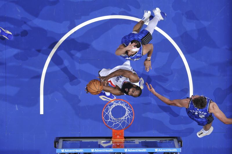 ORLANDO, FL - MARCH 29: James Harden #1 of the LA Clippers drives to the basket during the game against the Orlando Magic on March 29, 2024 at the Kia Center in Orlando, Florida. NOTE TO USER: User expressly acknowledges and agrees that, by downloading and or using this photograph, User is consenting to the terms and conditions of the Getty Images License Agreement. Mandatory Copyright Notice: Copyright 2024 NBAE (Photo by Fernando Medina/NBAE via Getty Images)