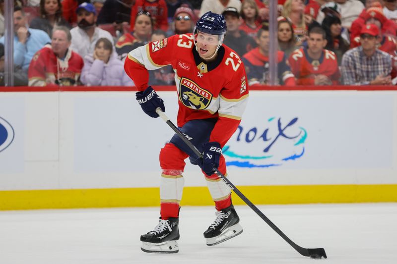 Apr 23, 2024; Sunrise, Florida, USA; Florida Panthers center Carter Verhaeghe (23) shoots the puck against the Tampa Bay Lightning during the second period in game two of the first round of the 2024 Stanley Cup Playoffs at Amerant Bank Arena. Mandatory Credit: Sam Navarro-USA TODAY Sports