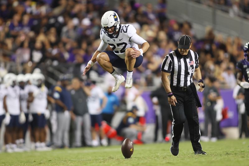 Sep 30, 2023; Fort Worth, Texas, USA; West Virginia Mountaineers place kicker Michael Hayes (22) warms up before a kickoff in the third quarter against the TCU Horned Frogs at Amon G. Carter Stadium. Mandatory Credit: Tim Heitman-USA TODAY Sports