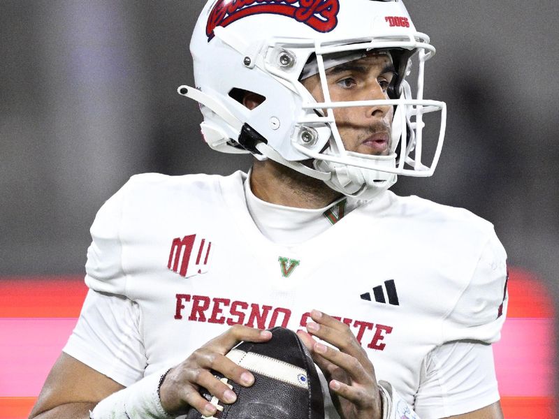 Nov 25, 2023; San Diego, California, USA; Fresno State Bulldogs quarterback Mikey Keene (1) looks to pass during the first half against the San Diego State Aztecs at Snapdragon Stadium. Mandatory Credit: Orlando Ramirez-USA TODAY Sports