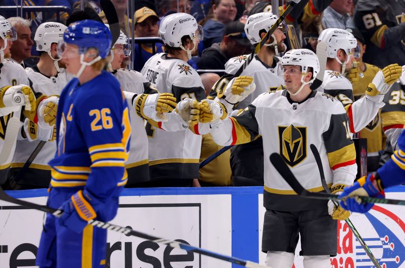 Mar 15, 2025; Buffalo, New York, USA;  Vegas Golden Knights left wing Pavel Dorofeyev (16) celebrates his goal with teammates during the second period against the Buffalo Sabres at KeyBank Center. Mandatory Credit: Timothy T. Ludwig-Imagn Images