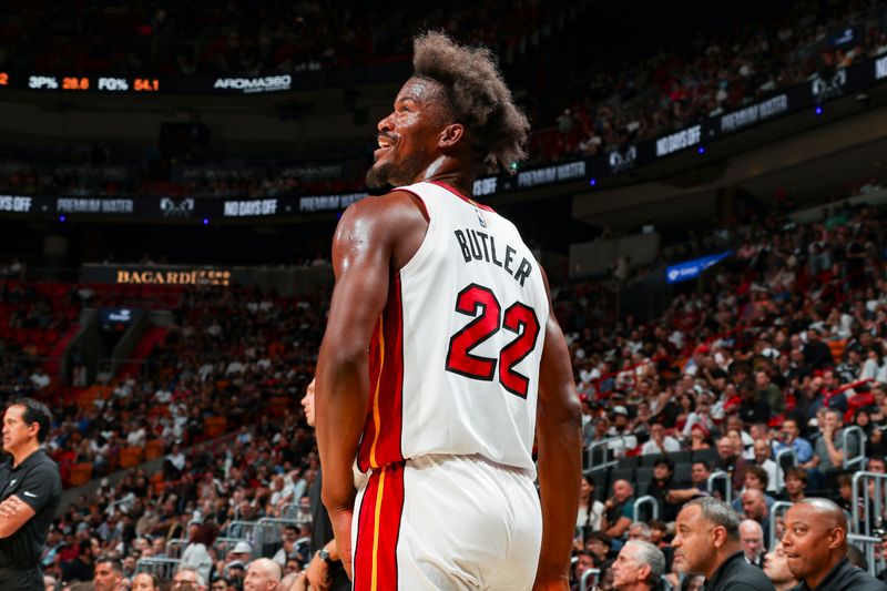 MIAMI, FL - OCTOBER 15: Jimmy Butler #22 of the Miami Heat looks on during the game on October 15, 2024 at Kaseya Center in Miami, Florida. NOTE TO USER: User expressly acknowledges and agrees that, by downloading and or using this Photograph, user is consenting to the terms and conditions of the Getty Images License Agreement. Mandatory Copyright Notice: Copyright 2024 NBAE (Photo by Issac Baldizon/NBAE via Getty Images)