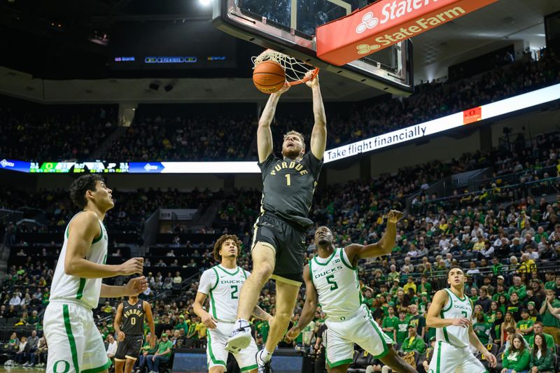 Jan 18, 2025; Eugene, Oregon, USA; Purdue Boilermakers forward Caleb Furst (1) dunks the ball during the second half against the Oregon Ducks at Matthew Knight Arena. Mandatory Credit: Craig Strobeck-Imagn Images