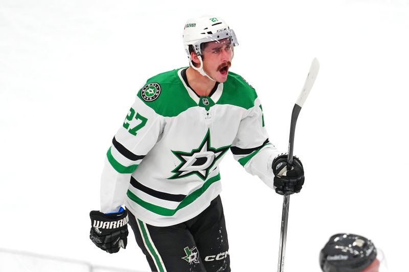 Dec 6, 2024; Las Vegas, Nevada, USA; Dallas Stars left wing Mason Marchment (27) celebrates after scoring a goal against the Vegas Golden Knights during the third period at T-Mobile Arena. Mandatory Credit: Stephen R. Sylvanie-Imagn Images