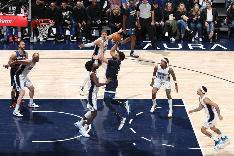 MINNEAPOLIS, MN -  FEBRUARY 2: Karl-Anthony Towns #32 of the Minnesota Timberwolves shoots the ball during the game against the Orlando Magic on February 2, 2024 at Target Center in Minneapolis, Minnesota. NOTE TO USER: User expressly acknowledges and agrees that, by downloading and or using this Photograph, user is consenting to the terms and conditions of the Getty Images License Agreement. Mandatory Copyright Notice: Copyright 2024 NBAE (Photo by David Sherman/NBAE via Getty Images)