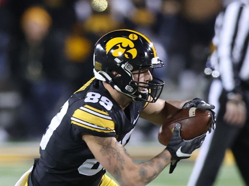 Nov 25, 2022; Iowa City, Iowa, USA; Iowa Hawkeyes wide receiver Nico Ragaini (89) catches a pass against the Nebraska Cornhuskers at Kinnick Stadium. Mandatory Credit: Reese Strickland-USA TODAY Sports