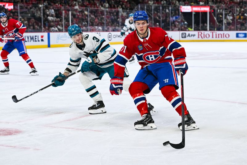 Mar 14, 2026; Montreal, Quebec, CAN; Montreal Canadiens center Jake Evans (71) plays the puck against San Jose Sharks defenseman John Klingberg (3) during the second period at Bell Centre. Mandatory Credit: David Kirouac-Imagn Images Mar 14, 2026; Montreal, Quebec, CAN; Montreal Canadiens center Jake Evans (71) plays the puck against San Jose Sharks defenseman John Klingberg (3) during the second period at Bell Centre. Mandatory Credit: David Kirouac-Imagn Images