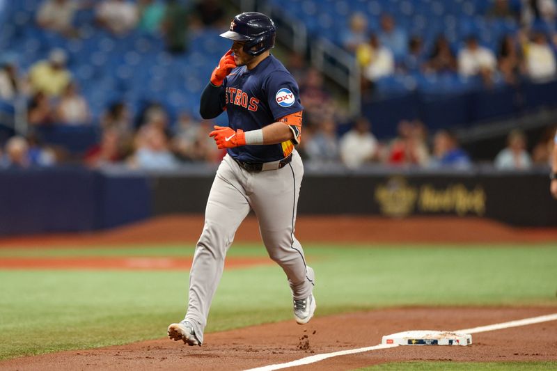 Aug 12, 2024; St. Petersburg, Florida, USA; Houston Astros catcher Yainer Diaz (21) runs the bases after hitting a three run home run against the Tampa Bay Rays in the third inning at Tropicana Field. Mandatory Credit: Nathan Ray Seebeck-USA TODAY Sports