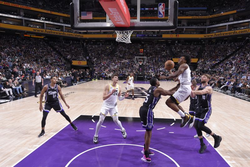 SACRAMENTO, CA - MARCH 31: Colin Sexton #2 of the Utah Jazz drives to the basket during the game against the Sacramento Kings on March 31, 2024 at Golden 1 Center in Sacramento, California. NOTE TO USER: User expressly acknowledges and agrees that, by downloading and or using this Photograph, user is consenting to the terms and conditions of the Getty Images License Agreement. Mandatory Copyright Notice: Copyright 2024 NBAE (Photo by Rocky Widner/NBAE via Getty Images)