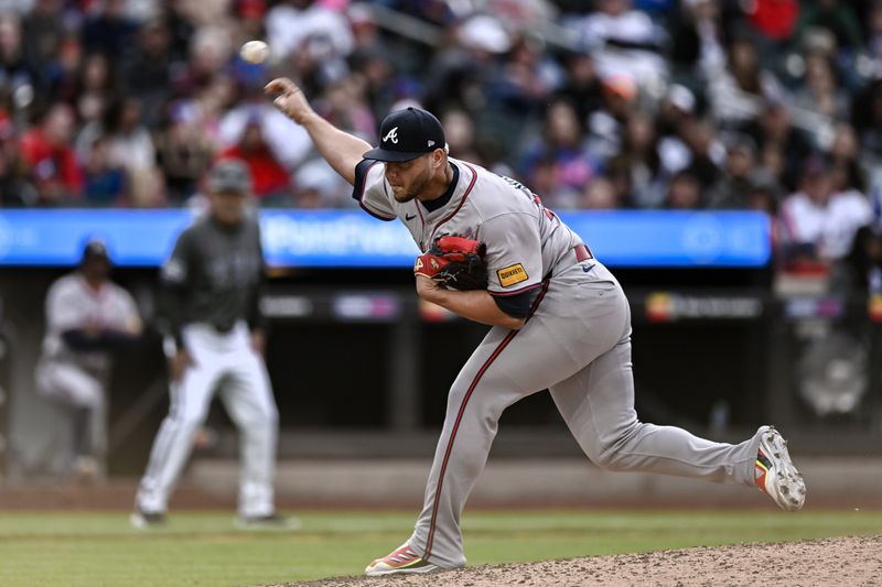 May 11, 2024; New York City, New York, USA; Atlanta Braves pitcher Joe Jiménez (77) throws against the New York Mets during the eighth inning at Citi Field. Mandatory Credit: John Jones-USA TODAY Sports