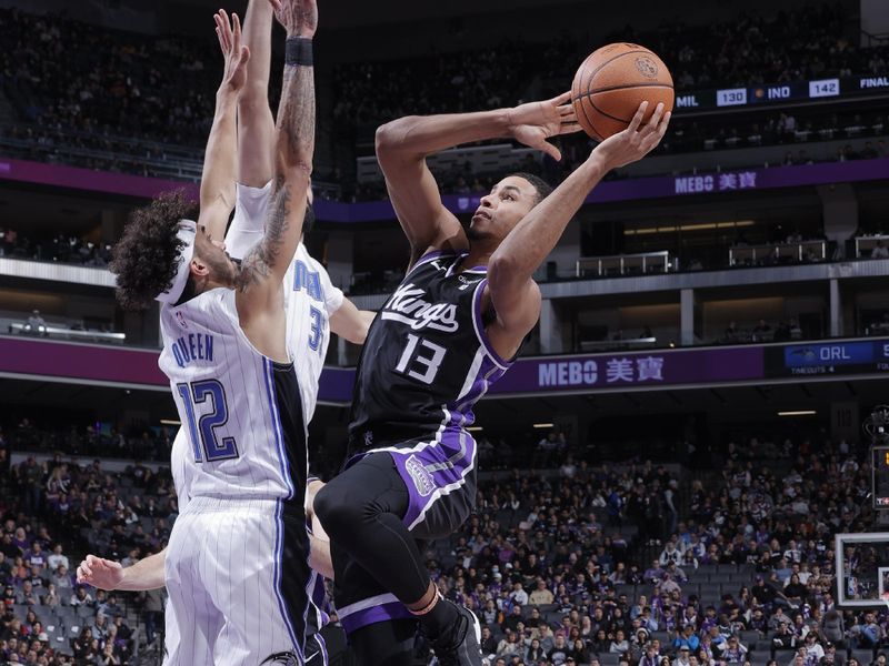 SACRAMENTO, CA - JANUARY 3: Keegan Murray #13 of the Sacramento Kings drives to the basket during the game against the Orlando Magic on January 3, 2024 at Golden 1 Center in Sacramento, California. NOTE TO USER: User expressly acknowledges and agrees that, by downloading and or using this Photograph, user is consenting to the terms and conditions of the Getty Images License Agreement. Mandatory Copyright Notice: Copyright 2024 NBAE (Photo by Rocky Widner/NBAE via Getty Images)