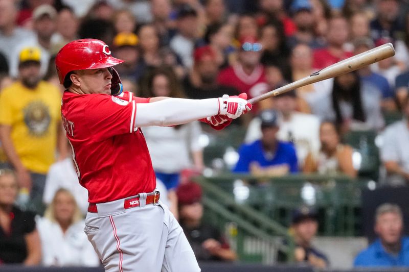 Sep 27, 2025; Milwaukee, Wisconsin, USA;  Cincinnati Reds first baseman Sal Stewart (43) hits an RBI single during the third inning against the Milwaukee Brewers at American Family Field. Mandatory Credit: Jeff Hanisch-Imagn Images