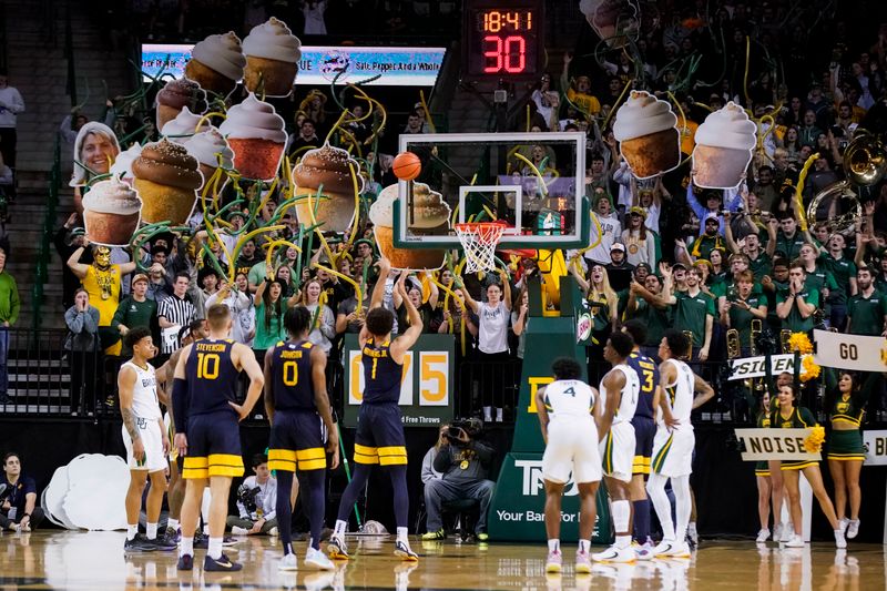 Feb 13, 2023; Waco, Texas, USA; West Virginia Mountaineers forward Emmitt Matthews Jr. (1) shoots a free throw into the Baylor student section during the second half at Ferrell Center. Mandatory Credit: Raymond Carlin III-USA TODAY Sports