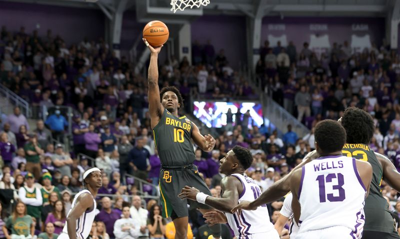 Feb 11, 2023; Fort Worth, Texas, USA;  Baylor Bears guard Adam Flagler (10) shoots over TCU Horned Frogs guard Damion Baugh (10) during the second half at Ed and Rae Schollmaier Arena. Mandatory Credit: Kevin Jairaj-USA TODAY Sports