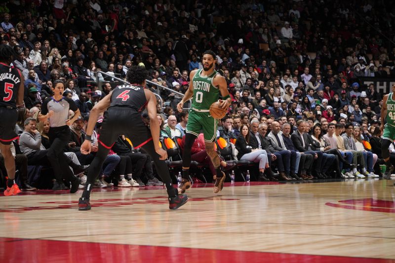 TORONTO, CANADA - JANUARY 15: Jayson Tatum #0 of the Boston Celtics handles the ball during the game against the Toronto Raptors  on January 15, 2024 at the Scotiabank Arena in Toronto, Ontario, Canada.  NOTE TO USER: User expressly acknowledges and agrees that, by downloading and or using this Photograph, user is consenting to the terms and conditions of the Getty Images License Agreement.  Mandatory Copyright Notice: Copyright 2024 NBAE (Photo by Mark Blinch/NBAE via Getty Images)