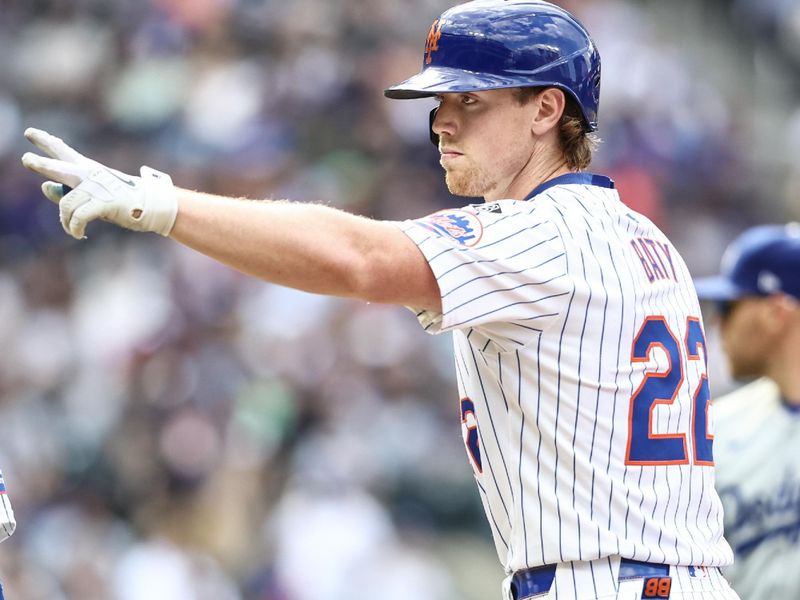 May 29, 2024; New York City, New York, USA;  New York Mets third base Brett Baty (22) gestures after hitting a single in the third inning against the Los Angeles Dodgers at Citi Field. Mandatory Credit: Wendell Cruz-USA TODAY Sports