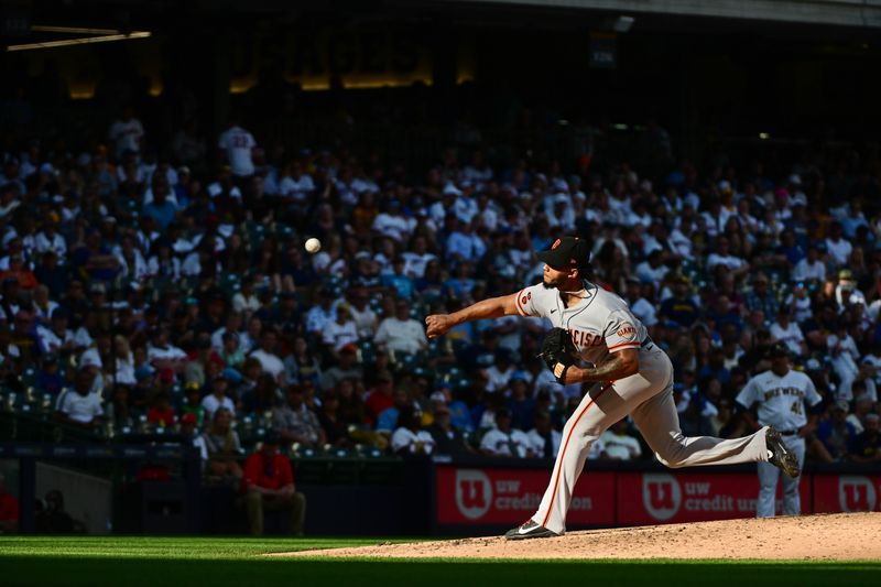 May 27, 2023; Milwaukee, Wisconsin, USA; San Francisco Giants pitcher Camilo Doval (75) pitches against the Milwaukee Brewers in the ninth inning at American Family Field. Mandatory Credit: Benny Sieu-USA TODAY Sports