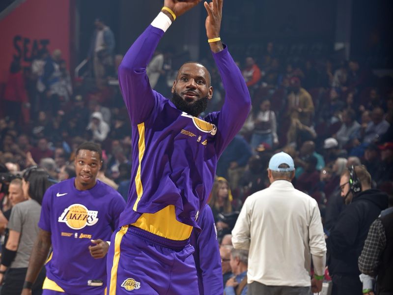 CLEVELAND, OH - DECEMBER 6: LeBron James #6 of the Los Angeles Lakers warms up before the game against the Cleveland Cavaliers on December 6, 2022 at Rocket Mortgage FieldHouse in Cleveland, Ohio. NOTE TO USER: User expressly acknowledges and agrees that, by downloading and/or using this Photograph, user is consenting to the terms and conditions of the Getty Images License Agreement. Mandatory Copyright Notice: Copyright 2022 NBAE (Photo by David Liam Kyle/NBAE via Getty Images)