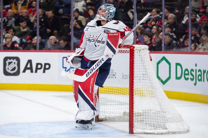 Jan 16, 2025; Ottawa, Ontario, CAN; Washington Capitals goalie Logan Thompson (48) relaxes in the first period against the Ottawa Senators at the Canadian Tire Centre. Mandatory Credit: Marc DesRosiers-Imagn Images