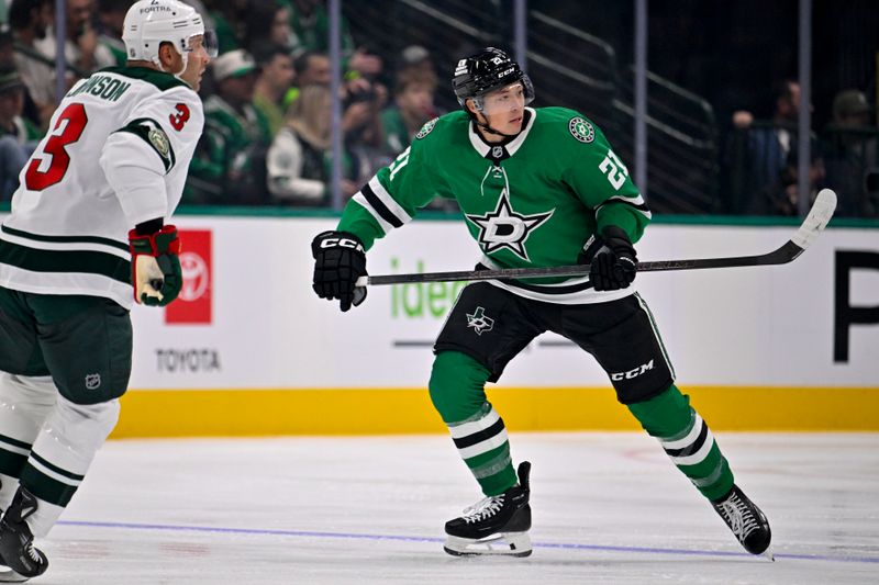 Sep 23, 2025; Dallas, Texas, USA; Dallas Stars left wing Jason Robertson (21) skates against the Minnesota Wild during the second period at American Airlines Center. Mandatory Credit: Jerome Miron-Imagn Images