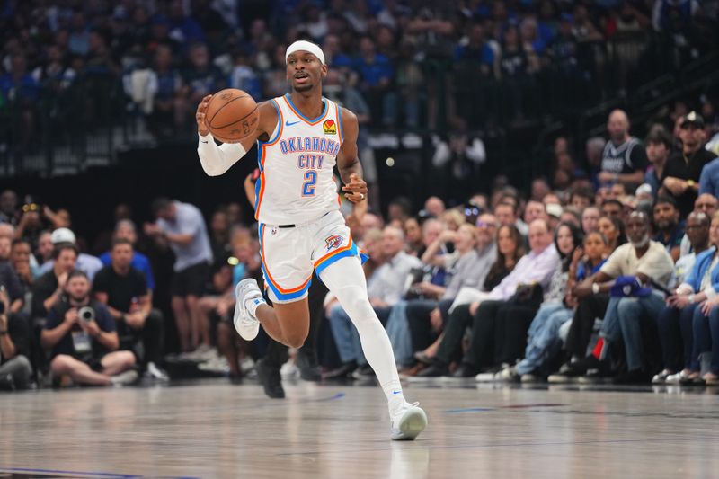 DALLAS, TX - MAY 18: Shai Gilgeous-Alexander #2 of the Oklahoma City Thunder dribbles the ball during the game against the Dallas Mavericks during Round 2 Game 6 of the 2024 NBA Playoffs on May 18, 2024 at the American Airlines Center in Dallas, Texas. NOTE TO USER: User expressly acknowledges and agrees that, by downloading and or using this photograph, User is consenting to the terms and conditions of the Getty Images License Agreement. Mandatory Copyright Notice: Copyright 2024 NBAE (Photo by Cooper Neill/NBAE via Getty Images)