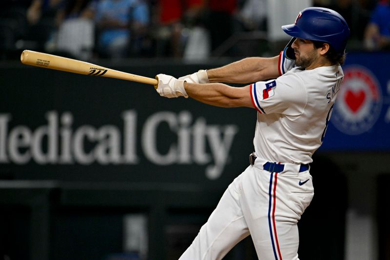 Apr 23, 2024; Arlington, Texas, USA; Texas Rangers third baseman Josh Smith (8) hits a double against the Seattle Mariners during the fourth inning at Globe Life Field. Mandatory Credit: Jerome Miron-USA TODAY Sports