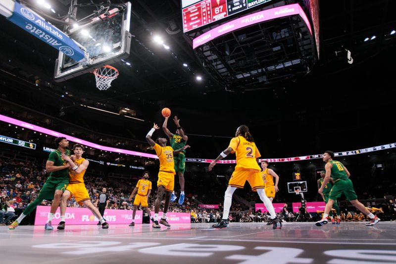 Mar 10, 2026; Kansas City, MO, USA; Baylor Bears guard Tounde Yessoufou (24) shoots over Arizona State Sun Devils center Massamba Diop (35) during the second half at T-Mobile Center. Mandatory Credit: William Purnell-Imagn Images