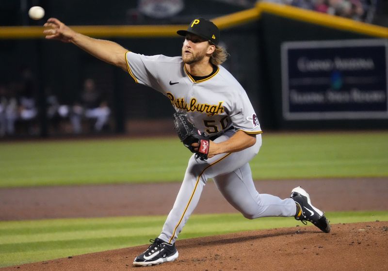 Jul 9, 2023; Phoenix, Arizona, USA; Pittsburgh Pirates Carmen Mlodzinski (50) pitches in the first inning against Arizona Diamondbacks at Chase Field. Mandatory Credit: Joe Rondone-USA TODAY Sports