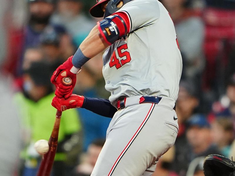 May 10, 2024; Boston, Massachusetts, USA; Washington Nationals first baseman Joey Meneses (45) hits an RBI single against the Boston Red Sox during the third inning at Fenway Park. Mandatory Credit: Gregory Fisher-USA TODAY Sports