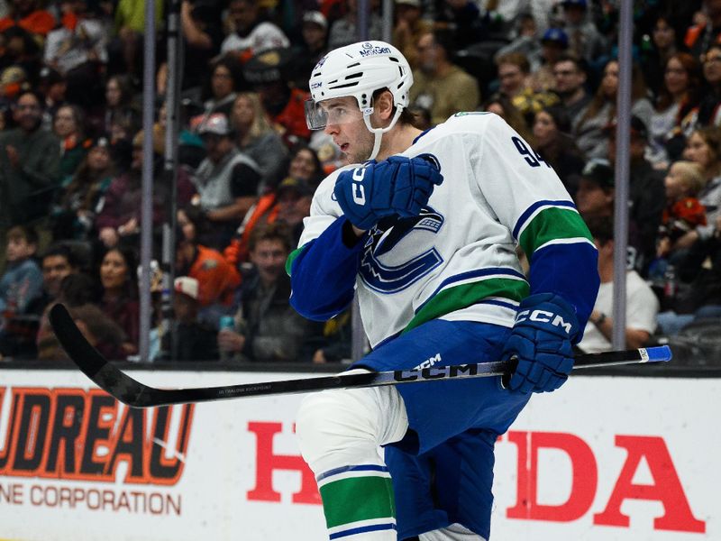 Nov 26, 2025; Anaheim, California, USA; Vancouver Canucks center Linus Karlsson (94) reacts after scoring a goal during the first period against the Anaheim Ducks at Honda Center. Mandatory Credit: William Liang-Imagn Images