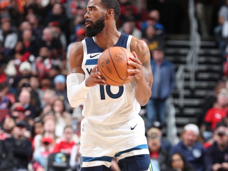 CHICAGO, IL - NOVEMBER 7: Mike Conley #10 of the Minnesota Timberwolves handles the ball during the game against the Chicago Bulls on November 7, 2024 at United Center in Chicago, Illinois. NOTE TO USER: User expressly acknowledges and agrees that, by downloading and or using this photograph, User is consenting to the terms and conditions of the Getty Images License Agreement. Mandatory Copyright Notice: Copyright 2024 NBAE (Photo by Jeff Haynes/NBAE via Getty Images)