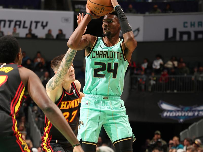 CHARLOTTE, NC - NOVEMBER 30: Brandon Miller #24 of the Charlotte Hornets shoots the ball during the game against the Atlanta Hawks on November 30, 2024 at Spectrum Center in Charlotte, North Carolina. NOTE TO USER: User expressly acknowledges and agrees that, by downloading and or using this photograph, User is consenting to the terms and conditions of the Getty Images License Agreement. Mandatory Copyright Notice: Copyright 2024 NBAE (Photo by Kent Smith/NBAE via Getty Images)