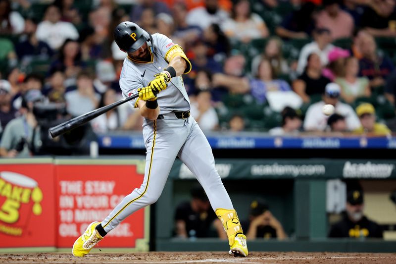 Jul 31, 2024; Houston, Texas, USA; Pittsburgh Pirates second baseman Jared Triolo (19) hits an RBI single against the Houston Astros during the second inning at Minute Maid Park. Mandatory Credit: Erik Williams-USA TODAY Sports