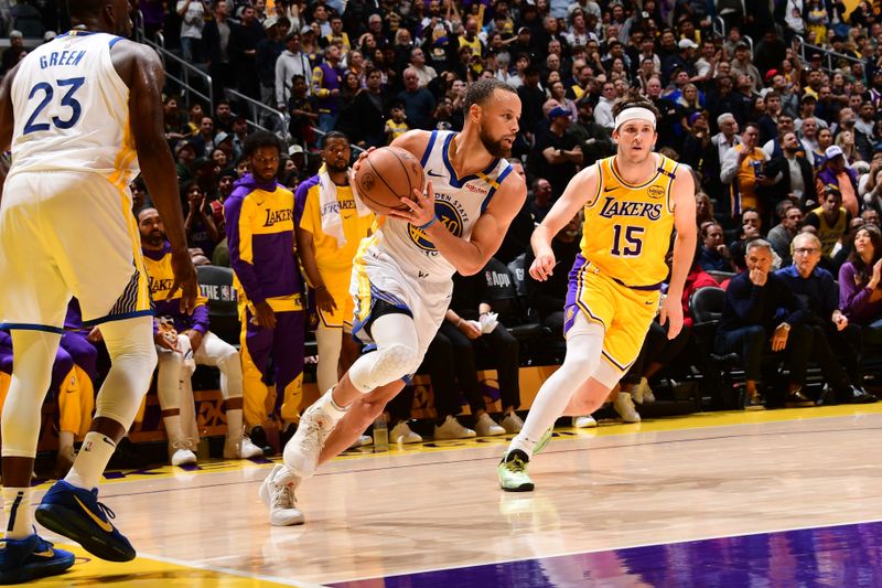 LOS ANGELES, CA - APRIL 3: Stephen Curry #30 of the Golden State Warriors dribbles the ball during the game against the Los Angeles Lakers     on April 3, 2025 at Crypto.Com Arena in Los Angeles, California. NOTE TO USER: User expressly acknowledges and agrees that, by downloading and/or using this Photograph, user is consenting to the terms and conditions of the Getty Images License Agreement. Mandatory Copyright Notice: Copyright 2025 NBAE (Photo by Adam Pantozzi/NBAE via Getty Images)