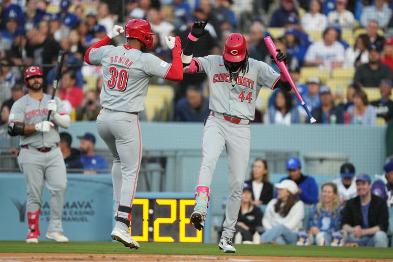 May 16, 2024; Los Angeles, California, USA; Cincinnati Reds center fielder Will Benson (30) celebrates with shortstop Elly De La Cruz (44) after hitting a home run in the first inning against the Los Angeles Dodgers at Dodger Stadium. Mandatory Credit: Kirby Lee-USA TODAY Sports