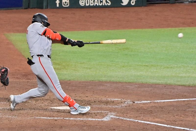 Sep 23, 2024; Phoenix, Arizona, USA;  San Francisco Giants outfielder Michael Conforto (8) doubles in the seventh inning against the Arizona Diamondbacks at Chase Field. Mandatory Credit: Matt Kartozian-Imagn Images