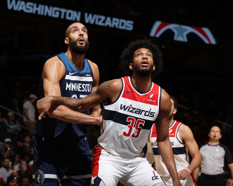 WASHINGTON, DC -? JANUARY 24: Mike Muscala #35 of the Washington Wizards and Rudy Gobert #27 of the Minnesota Timberwolves attempt to rebound the ball during the game on January 24, 2024 at Capital One Arena in Washington, DC. NOTE TO USER: User expressly acknowledges and agrees that, by downloading and or using this Photograph, user is consenting to the terms and conditions of the Getty Images License Agreement. Mandatory Copyright Notice: Copyright 2024 NBAE (Photo by Stephen Gosling/NBAE via Getty Images)