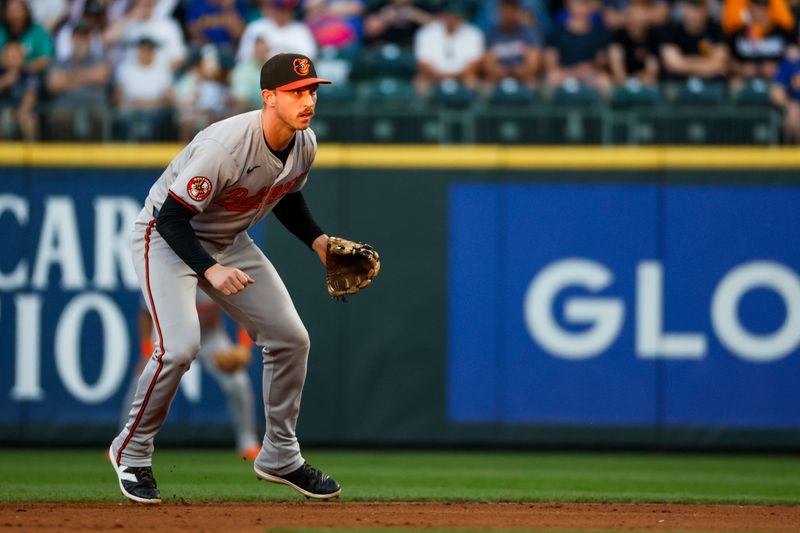 Jul 3, 2024; Seattle, Washington, USA; Baltimore Orioles second baseman Jordan Westburg (11) reacts to a pitch against the Seattle Mariners during the fifth inning at T-Mobile Park. Mandatory Credit: Joe Nicholson-USA TODAY Sports