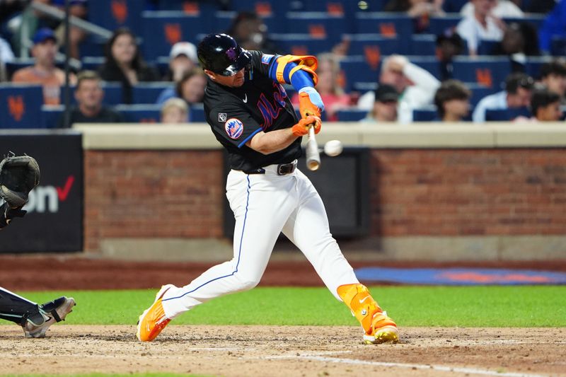 May 31, 2024; New York City, New York, USA; New York Mets first baseman Pete Alonso (20) hits an RBI double against the Arizona Diamondbacks during the fourth inning at Citi Field. Mandatory Credit: Gregory Fisher-USA TODAY Sports