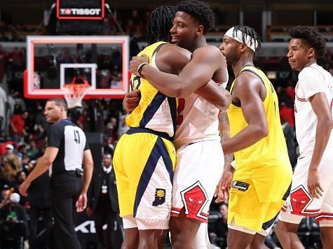 CHICAGO, IL - DECEMBER 28: Aaron Nesmith #23 of the Indiana Pacers embraces Terry Taylor #32 of the Chicago Bulls after the game on December 28, 2023 at United Center in Chicago, Illinois. NOTE TO USER: User expressly acknowledges and agrees that, by downloading and or using this photograph, User is consenting to the terms and conditions of the Getty Images License Agreement. Mandatory Copyright Notice: Copyright 2023 NBAE (Photo by Jeff Haynes/NBAE via Getty Images)